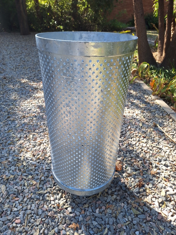 Photo of a round steel litter bin